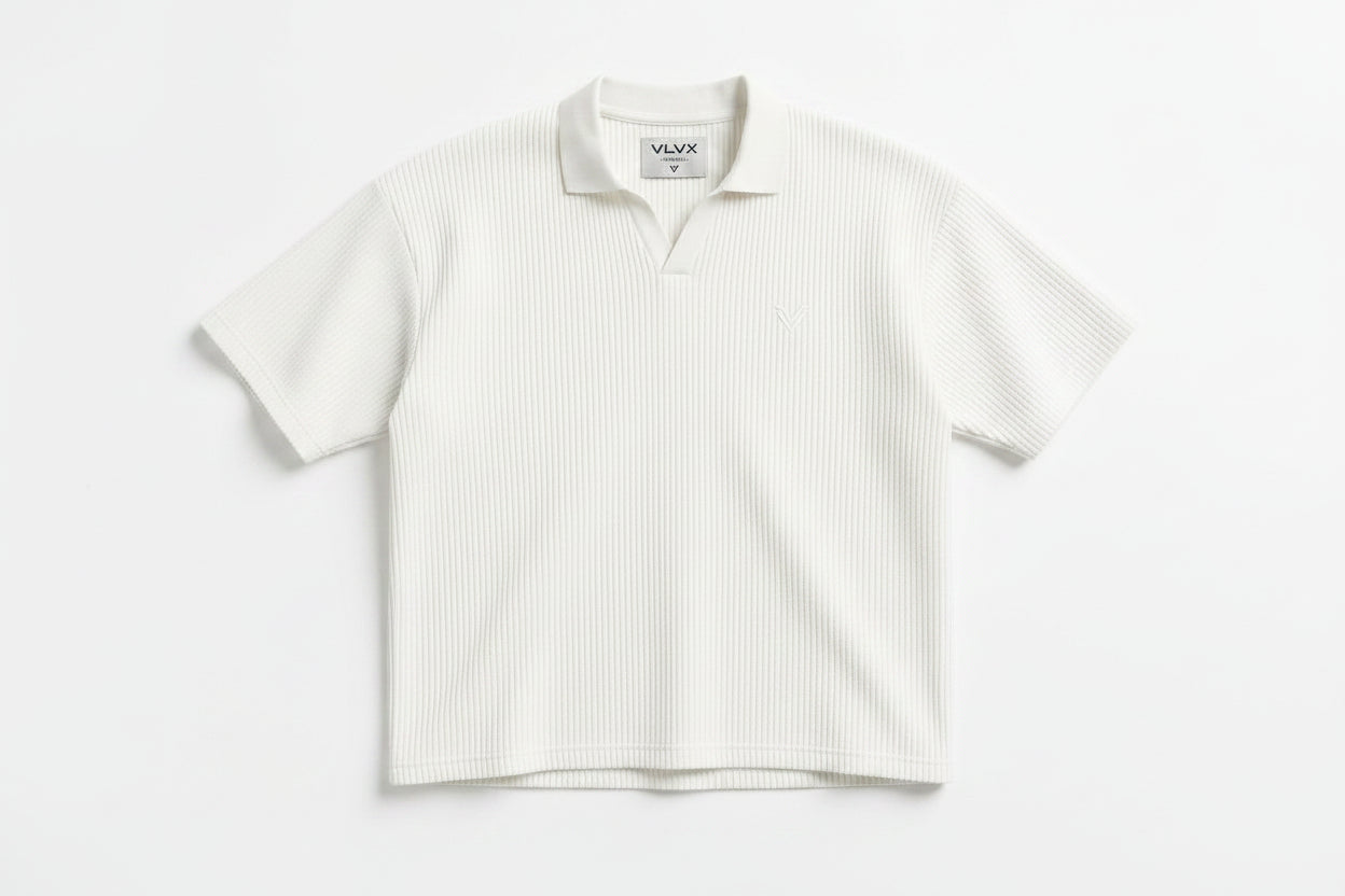 Black and white striped polo shirt with a logo on a light gray background